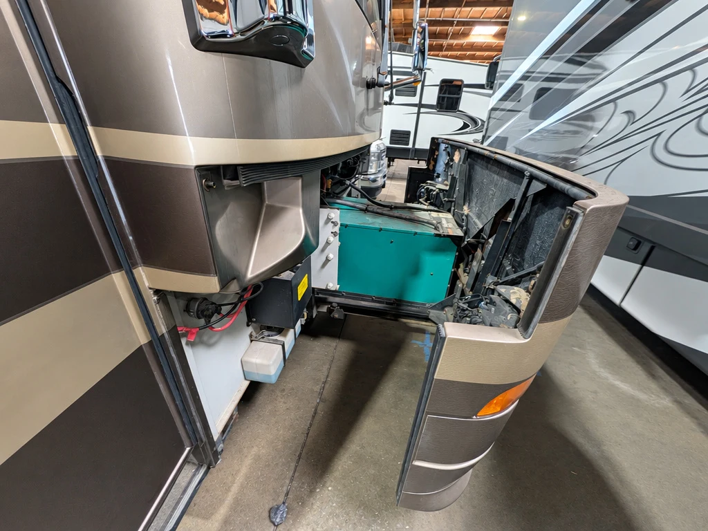 Class A motorhome front corner opened up for collision repair at El Toro RV Service