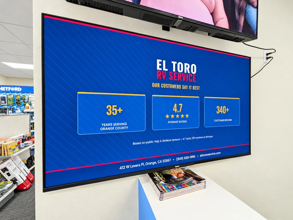 In-shop display showing El Toro RV Service customer ratings and years serving Orange County