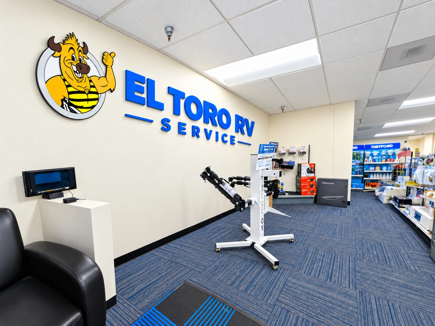 Blue Ox tow bar and hitch accessory display in the El Toro RV Service lobby