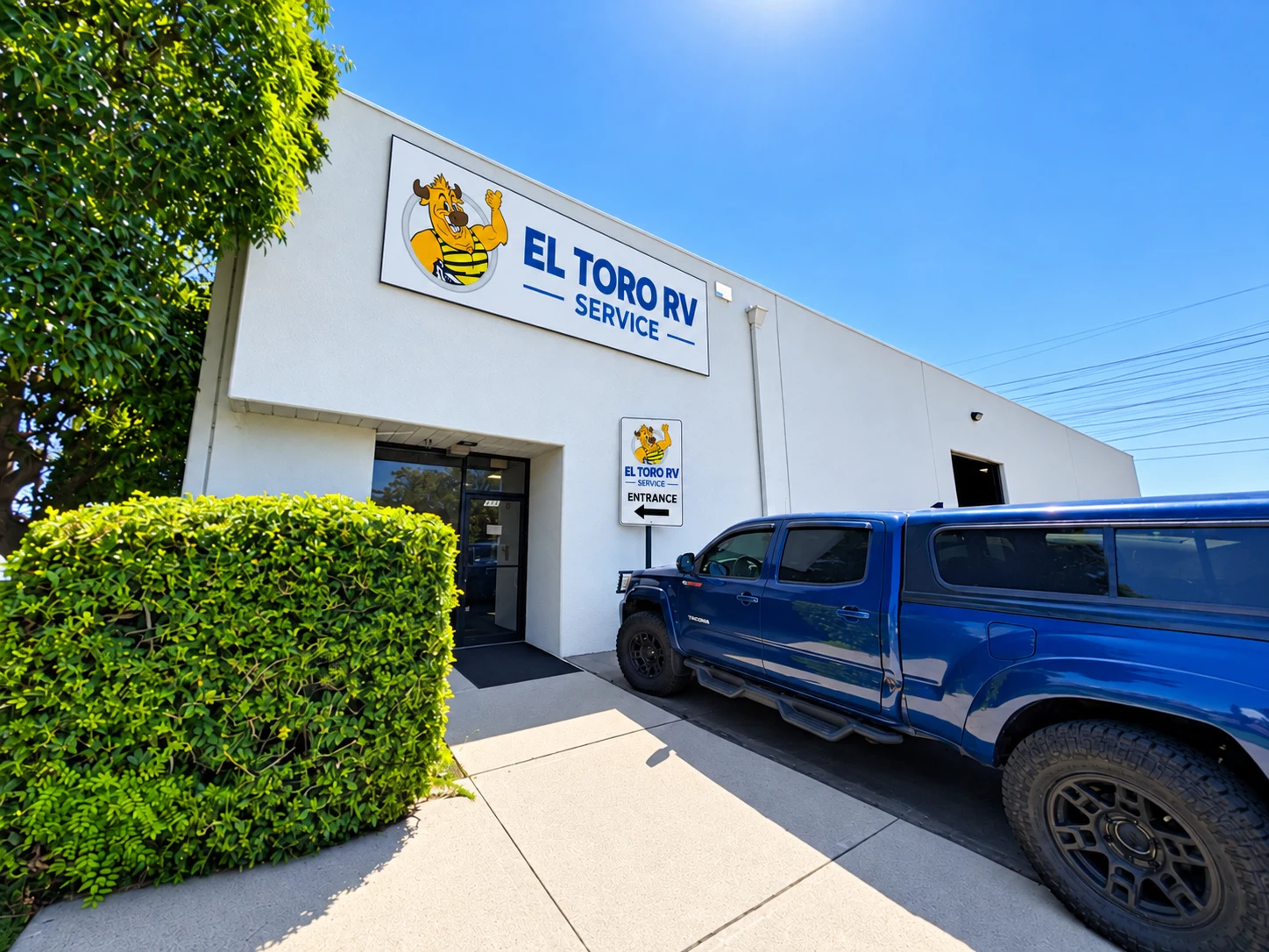 Front entrance of El Toro RV Service with the bull logo sign in Orange, CA