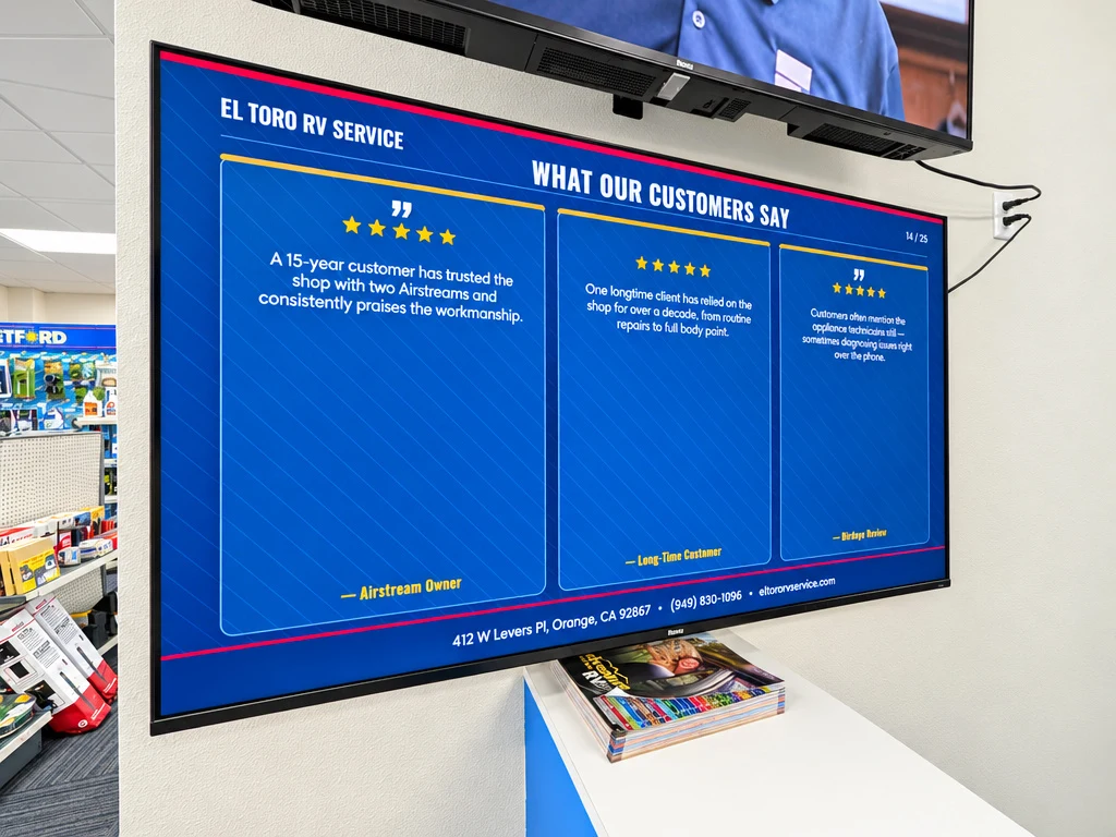 In-shop screen featuring customer testimonials for El Toro RV Service