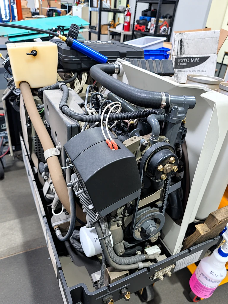 RV generator removed from its compartment for service at El Toro RV Service