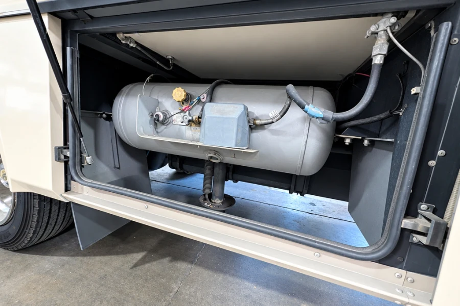 RV propane tank compartment opened for LP system inspection