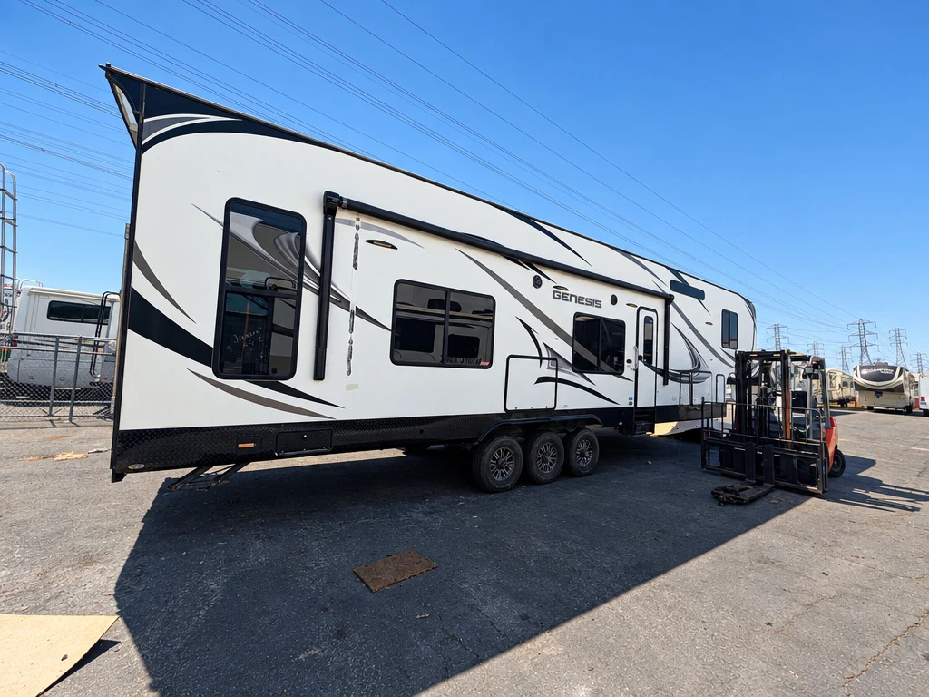 Toy hauler travel trailer outside El Toro RV Service in Orange, CA